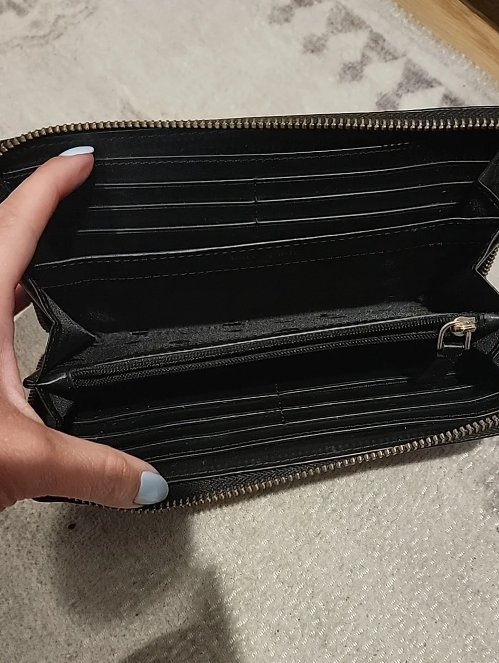 kate spade Black Leather Zip-Around Wallet
